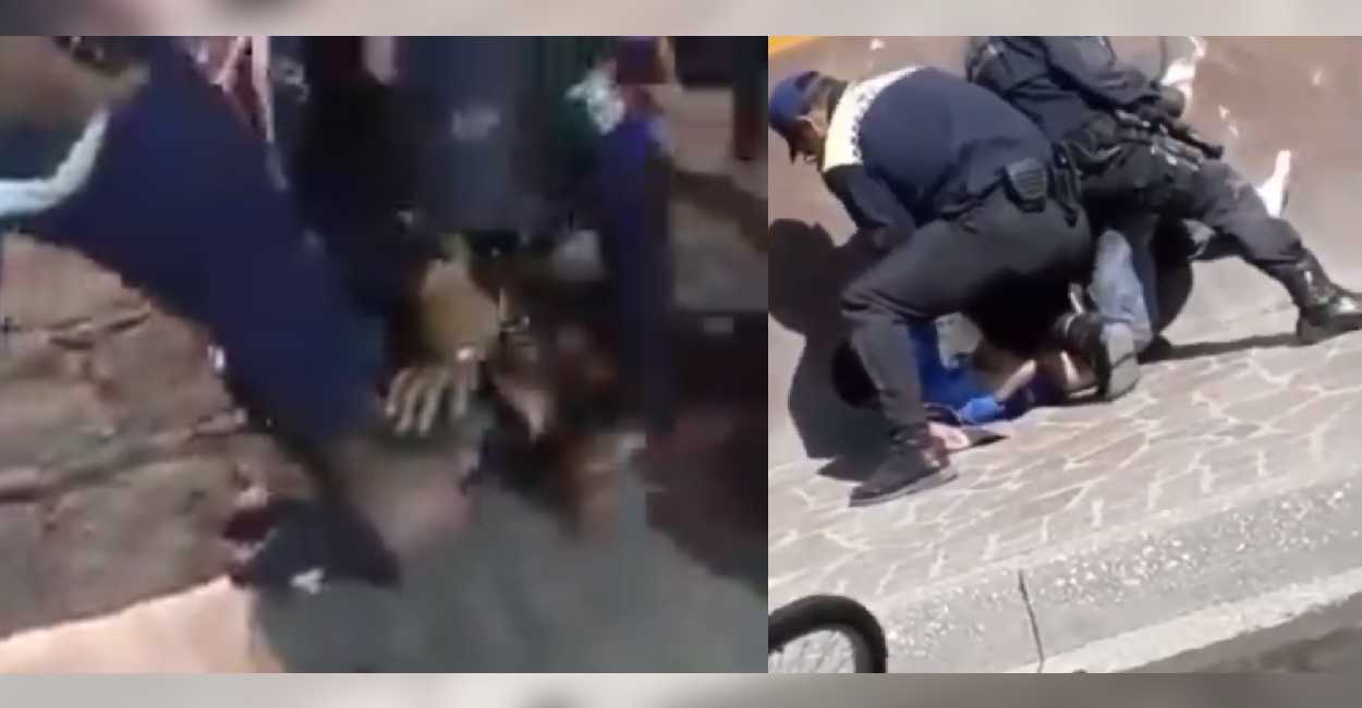 En la primer captura se ve como los policías someten a uno de los hombres presionando su cabeza con un pie contra el suelo; y en la segunda, se ve como entre dos están encima del otro hombre.