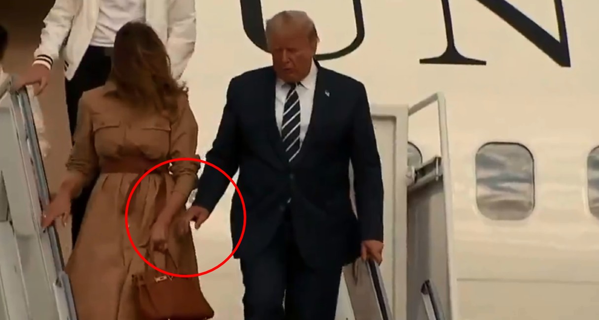 La primera dama quitó su brazo cuando Trump quiso tomarla. | Foto: captura de pantalla